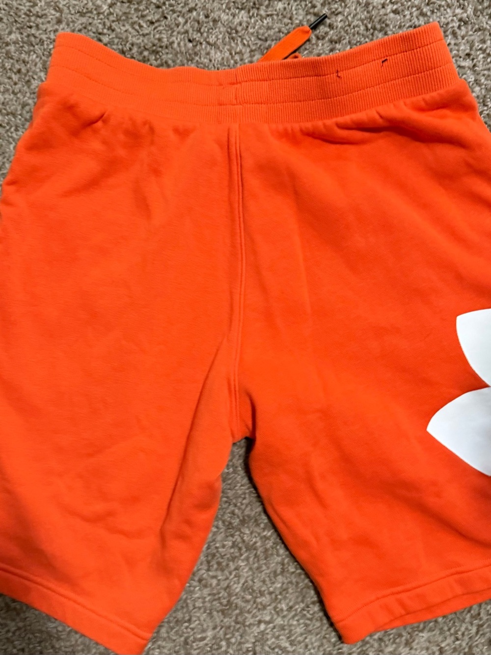 Under Armour Bright Orange men’s Athletic Shorts with Logo